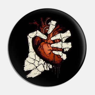 Skeleton Hand Squeezed Heart Pin