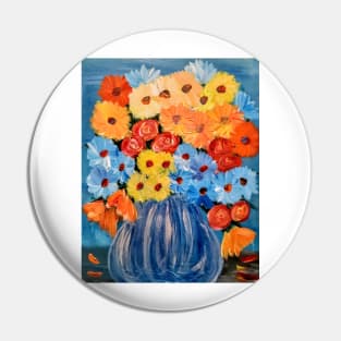 Some abstract vibrant colorful flowers in a glass vase with silver accent . Pin