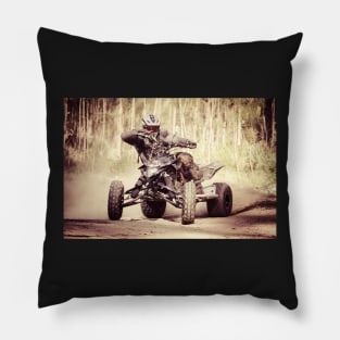 ATV racer takes a turn during a race. Pillow