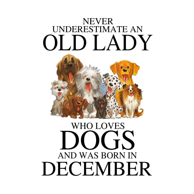 Never Underestimate An Old Lady Who Loves Dogs And Was Born In December by louismcfarland