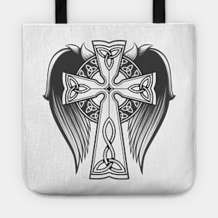 Cross in celtic style with big wings tattoo in engraving style. Tote