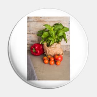 Fresh basil and other ingredients for Italian cuisine. Cherry tomatoes, basil and red pepper Pin