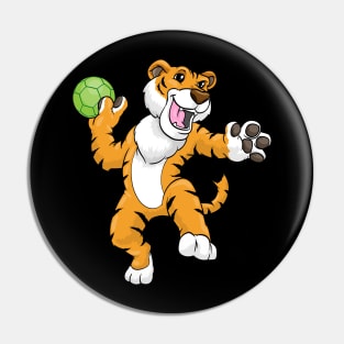 Funny tiger is playing handball Pin