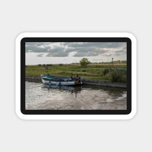 Small wooden pleasure boat moored in Thurne Dyke Magnet