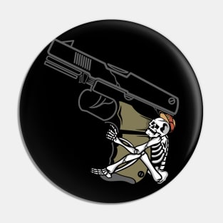 Gun and skull Pin