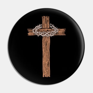 A wooden cross with a crown of thorns Pin