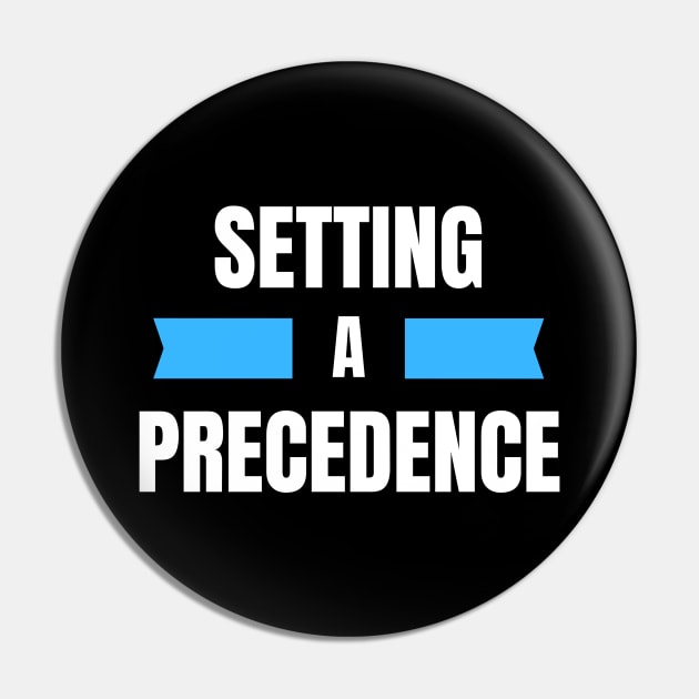 Setting A Precedence Pin by Benny Merch Pearl