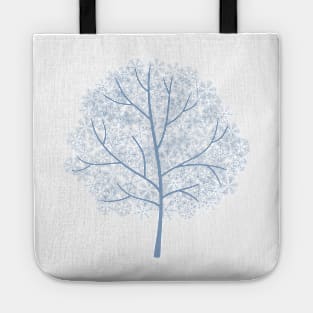 Winter tree covered with snowflakes Tote