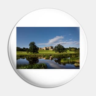 Alnwick Castle reflected in the River Aln. Pin