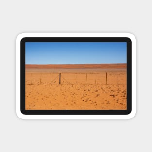 Fence across the desert. Magnet