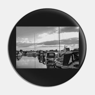 Boats moored in Thurne Dyke in the Norfolk Broads National Park Pin