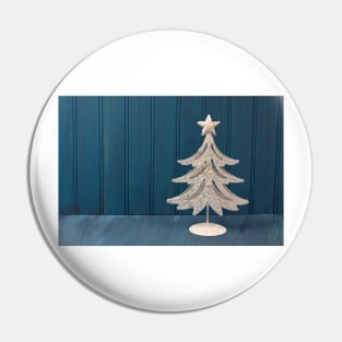 A White Christmas tree of metal Pin