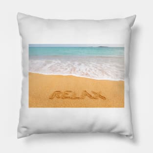 Inscription "RELAX" made on beautiful beach by the blue sea Pillow