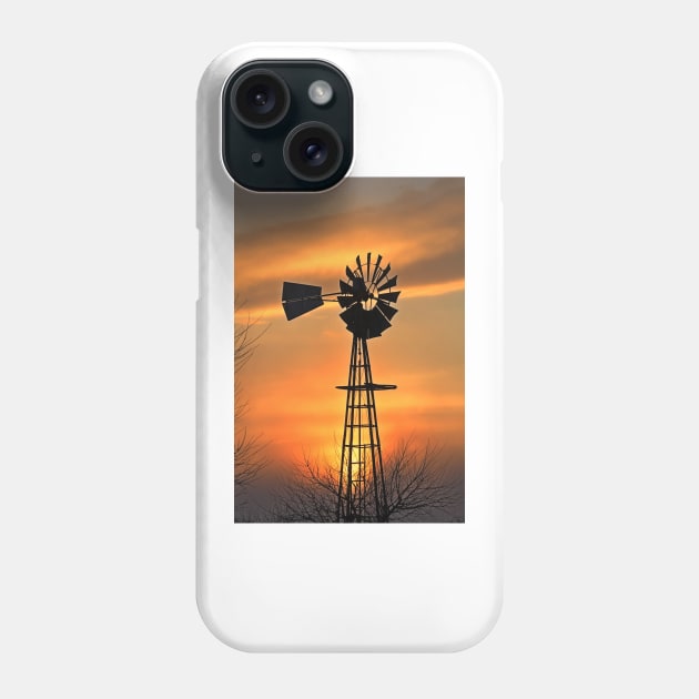 Kansas Windmill silhouette with a Golden sky. Phone Case by ROBERTDBROZEK