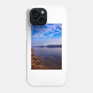 Clean water landscape scenery with clean sky and rocks Phone Case