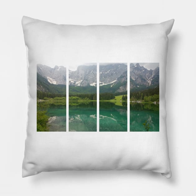 A static shot from the shore of Fusine lake in the Julian Alps with snowy mountains in background. Beautiful nature in a spring cloudy day; no people around Pillow by fabbroni-art