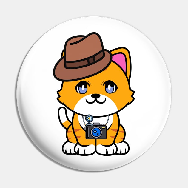 Cute orange cat is holding a camera Pin by Pet Station