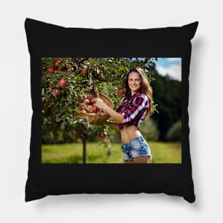 Beautiful woman picking apples Pillow