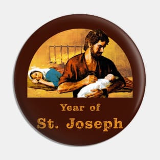 St. Joseph holds baby Jesus while Our Lady sleeps. Year of St. Joseph. Pin