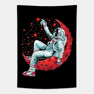 Astronaut lying on the moon Tapestry