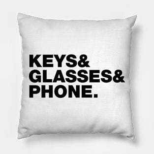 keys and glasses and phone. Pillow