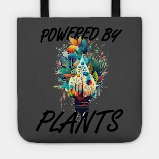 Light up your wardrobe with our 'Powered by Plants' tee! Featuring a vibrant illustration of plants and a powerful message for the vegan community Tote