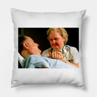 Geriatric care: elderly man reassured by nurse (M540/0193) Pillow