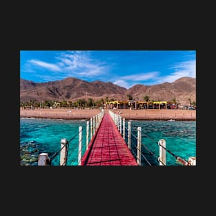 Beach bridge with colorful desert behind. Red sea Israel T-Shirt