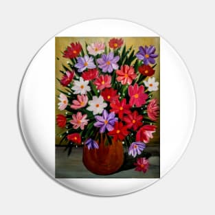 A beautiful bouquet of mixed flowers in a gold vase Pin