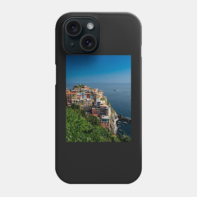 View on the cliff town of Manarola, one of the colorful Cinque Terre on the Italian west coast Phone Case by Dolfilms