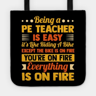 Being A PE Teacher Is Easy It's Like Riding A Bike Except The Bike Is On Fire you're on fire everything is on fire Tote