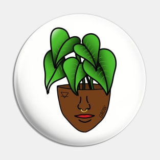 Dark Skinned Tropical Plant Person with Face Tattoos and Septum Piercing Pin