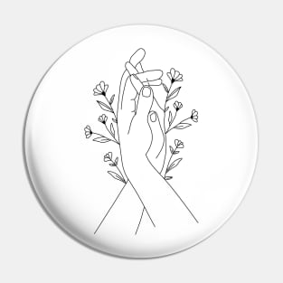 Hands holding flowers Pin