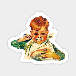 Red-haired boy eating Magnet