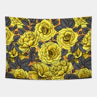 Yellow roses with dark gray leaves on orange Tapestry