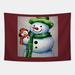 Cute Snowman holding a Baby Snowman under the Snow Tapestry