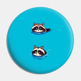 Raccoon Duo Swimming in Blue Water Pin