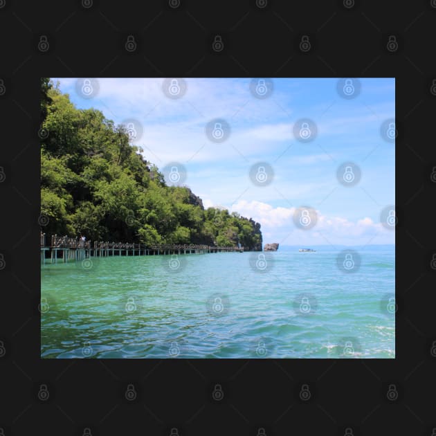 Pier over crystal clear water by Kuro