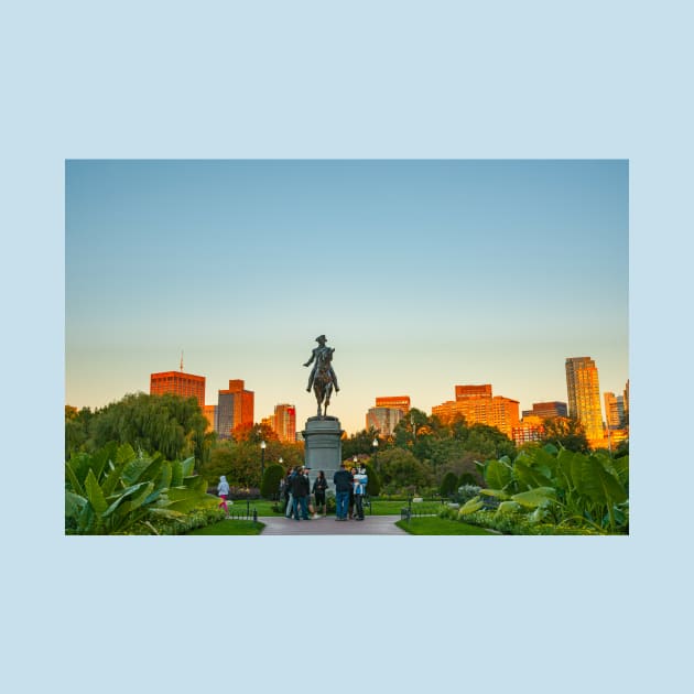 George Washingto statue, Boston USA - October 13 2014; City buildings catch late afternoon sun beyond Monument set against a blue sky in Boston Public Garden, by brians101