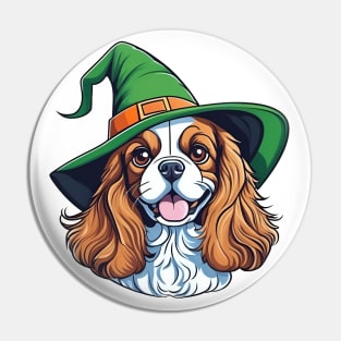 A brown and white dog wearing a green witches hat Pin