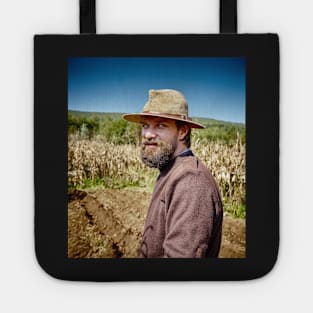 Young farmer closeup portrait outdoor Tote