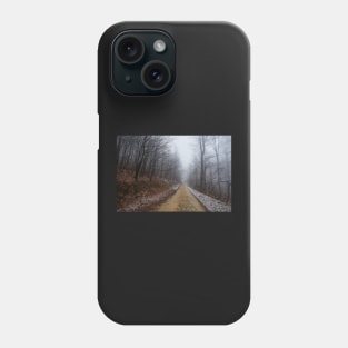 Foggy road in the forest Phone Case