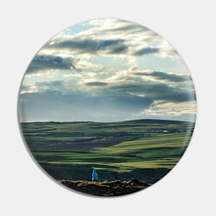 Walkers follow the path with views across the Mull of Galloway Pin