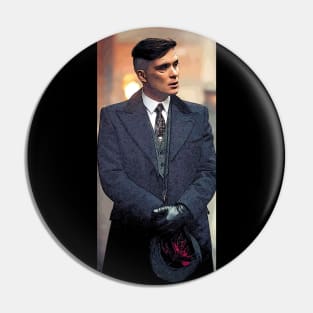 Thomas Shelby emotionally, with leather gloves and a hat, stands well dressed in his blue coat as abstract art Pin