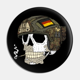 a bundeswehr skull with a flecktarn helmet. Pin