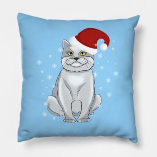 Christmas cat. Santa cat on a blue background with snowflakes. Pillow