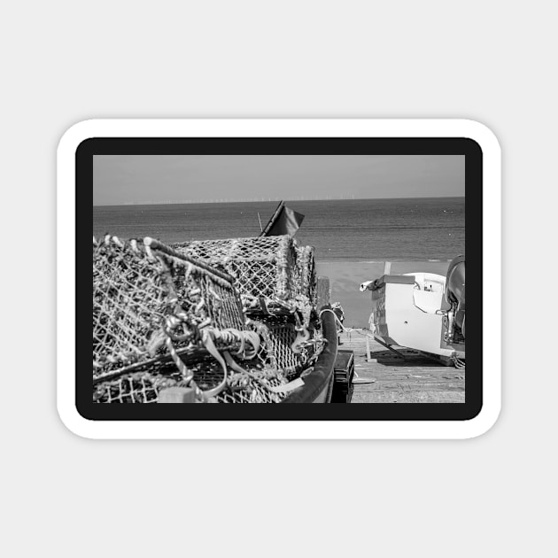 Lobster and crab pots on a fishing boat on the Norfolk coast Magnet by yackers1