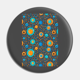 Vibrant orange and teal circles are scattered amidst an intricate array Pin