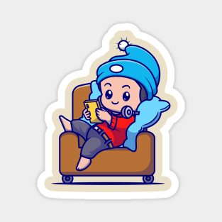 Cute Boy Operating Phone On Sofa Cartoon Magnet