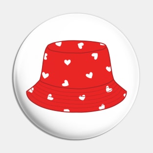 Red bucket hat with white hearts Pin